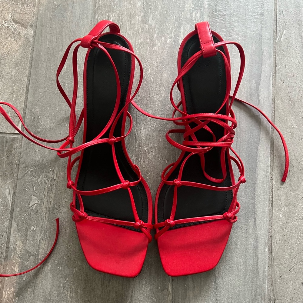 Red knotted strappy heeled sandals
